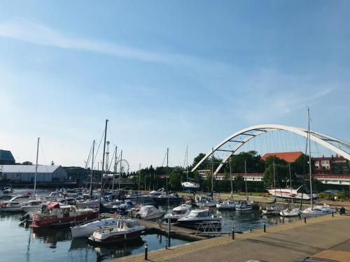 a bunch of boats are docked in a harbor at Unique Baltic Apartments - Apartament z garażem in Kołobrzeg