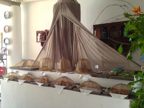 a shelf with some baskets and nets on it at Hotel Lisca Bianca in Panarea