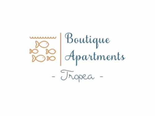 a sign with the words furniture apartments and troops at Boutique Apartment - Tropea in Tropea
