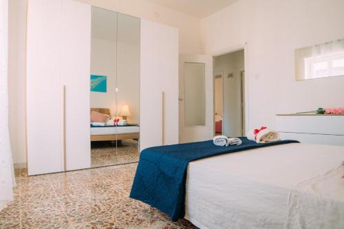 Ein Bett oder Betten in einem Zimmer der Unterkunft casa mare incantevole