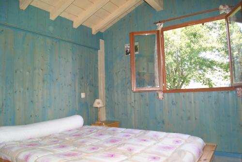 Cama o camas de una habitación en Chalets Etchemendigaraya