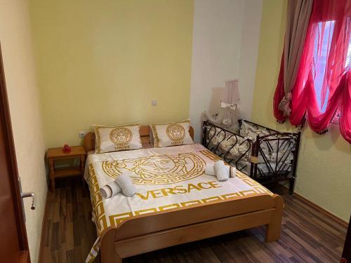 Łóżko lub łóżka w pokoju w obiekcie Apartments Mujovi