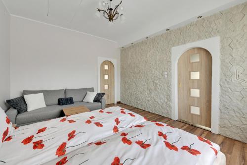 Postel nebo postele na pokoji v ubytování Oliwa House by Platinium Lofts