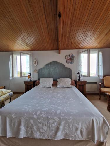 En eller flere senger på et rom på Chambres d'hôtes Villa bella fiora