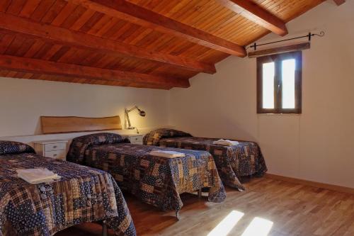 Cama o camas de una habitación en Agriturismo Passo dei Briganti