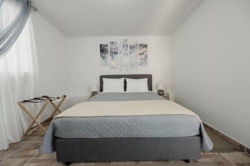 Postel nebo postele na pokoji v ubytování DINA'S Apartment in Kos
