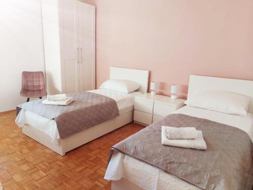 Postel nebo postele na pokoji v ubytování Apartment Karla