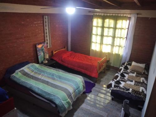 Säng eller sängar i ett rum på CASABLANCA