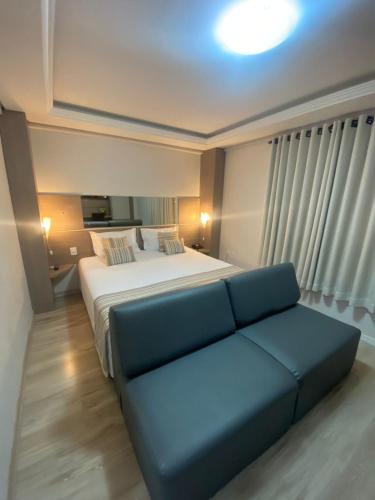 Katil atau katil-katil dalam bilik di Benos Hotel
