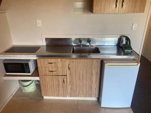 Cucina o angolo cottura di Mountain Chalets Motel