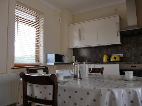 Kuchyň nebo kuchyňský kout v ubytování Penddaulwyn Uchaf Farm # Carmarthenshire
