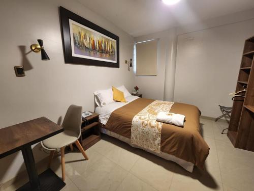 Ένα ή περισσότερα κρεβάτια σε δωμάτιο στο HOSTAL POSADA REAL