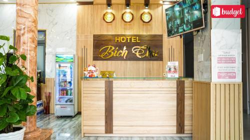 a hotel bar with a sign on the wall at Bich Thu Hotel in Ho Chi Minh City