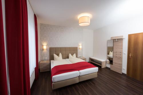 Tempat tidur dalam kamar di Hotel Südlohner Hof - Ristorante Da Fabio
