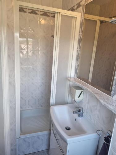 Ванная комната в Apartament Hexagon 33 - 5D Apartamenty