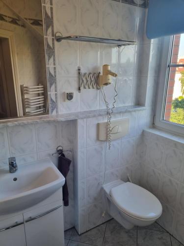 Ванная комната в Apartament Hexagon 33 - 5D Apartamenty