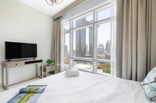 Fotografie z fotogalerie ubytování Luxury 2BR WALK to Burj Khalifa and Dubai Mall! شقة فاخرة غرفتين بجانب مول دبى وبرج خليفة v Dubaji