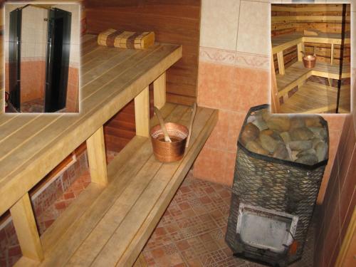 una sauna con banco y una cesta de leña en Kusti Turismitalu, en Vilsandi
