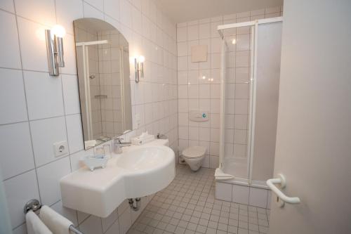 Vonios kambarys apgyvendinimo įstaigoje Hotel Südlohner Hof - Ristorante Da Fabio