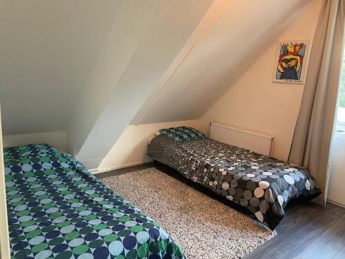 Ліжко або ліжка в номері Luxury villa with private Sauna and Jacuzzi in Holland