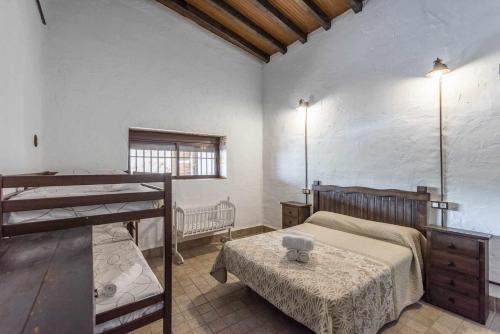 Säng eller sängar i ett rum på Casa Rural San Miguel