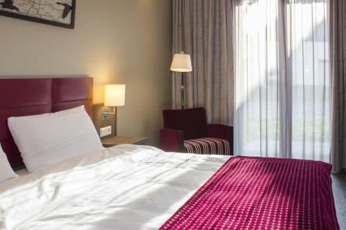 Postel nebo postele na pokoji v ubytování Hotel zur Krone
