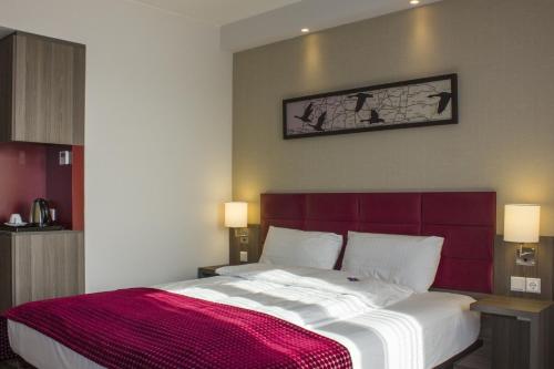 Postel nebo postele na pokoji v ubytování Hotel zur Krone