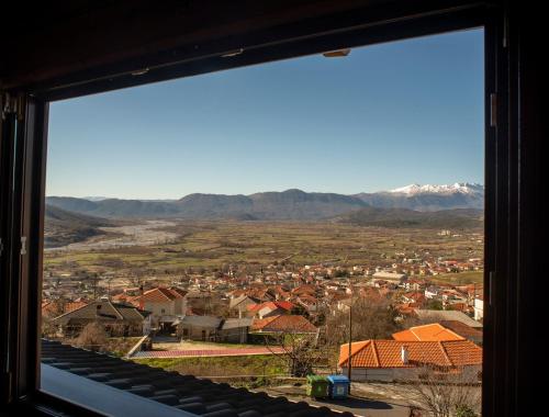 a view of a city from a window at Hotel Rodovoli in Konitsa