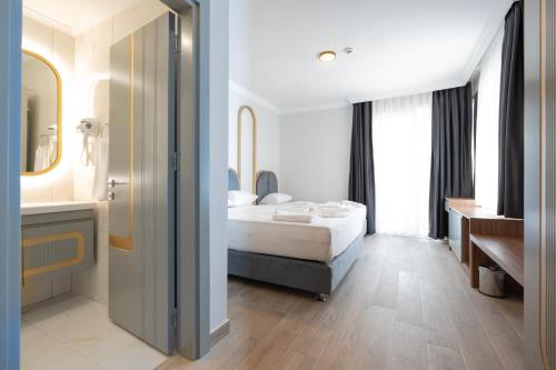 Кровать или кровати в номере Gurses Life Hotel