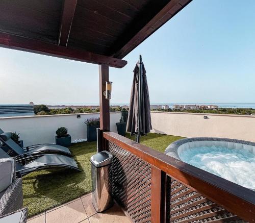 Sunset Deluxe con jacuzzi, piscina y barbacoa