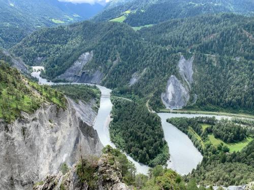 an aerial view of a river in a mountain valley at Casa Las Caglias in Flims