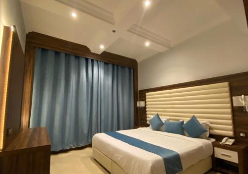 Cama o camas de una habitación en Dunes Hotel
