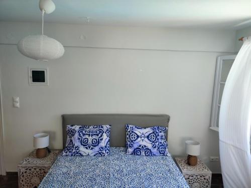 Ένα ή περισσότερα κρεβάτια σε δωμάτιο στο Astra Residential Apts