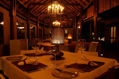 a dining room table set for a party at Moditlo River Lodge in Hoedspruit