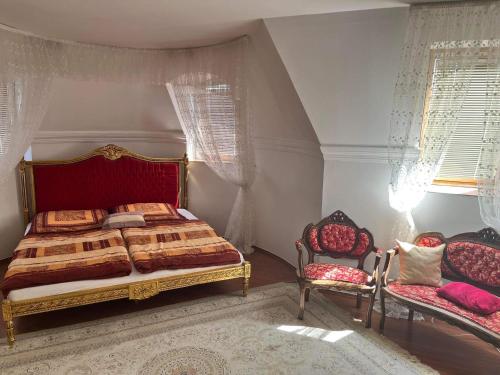 Posteľ alebo postele v izbe v ubytovaní Kastély Villa