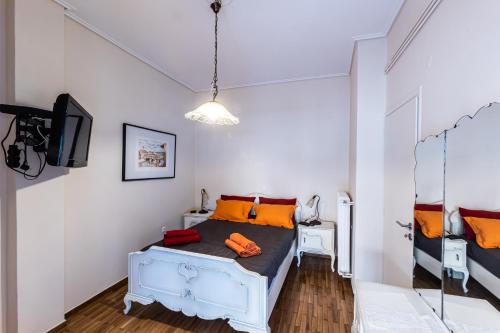 Posteľ alebo postele v izbe v ubytovaní Ami's Appartment in Athens