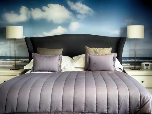 Oceanside Lifestyle Hotelにあるベッド
