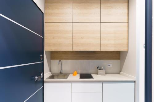 Kuchyň nebo kuchyňský kout v ubytování Nuvole Apartment near the beach