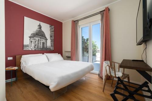 Postel nebo postele na pokoji v ubytování Suite al centro di Palermo con terrazza privata