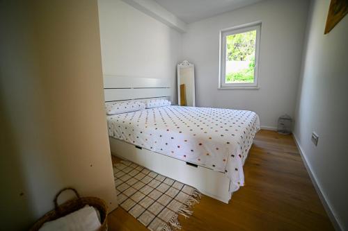 Postel nebo postele na pokoji v ubytování Apartment Bine
