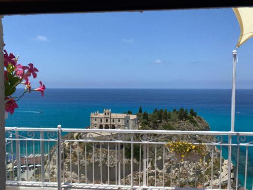 a view of the ocean from a balcony at BlueMind in Tropea