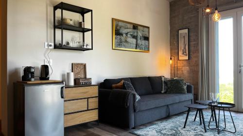 Posezení v ubytování Cascina GianTino suite Sughero - G A Y - M E N - O N L Y