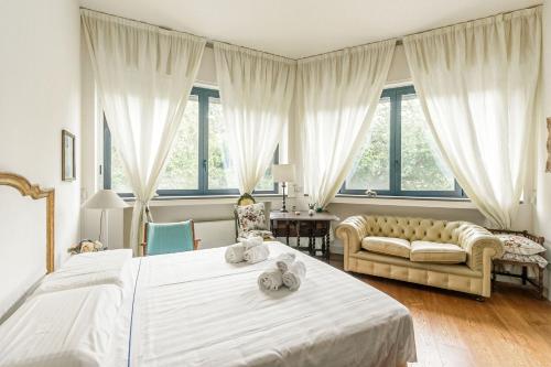 Posteľ alebo postele v izbe v ubytovaní Conca Del Naviglio One Bedroom by Halldis