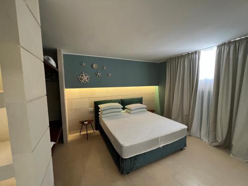 Postel nebo postele na pokoji v ubytování Euphoria Resort