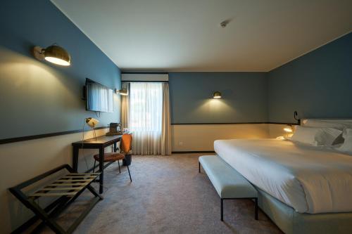 Ein Bett oder Betten in einem Zimmer der Unterkunft Octant Lousa