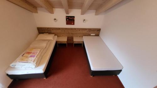 Postel nebo postele na pokoji v ubytování Haus Wechselberger
