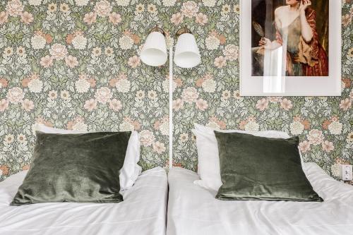Postel nebo postele na pokoji v ubytování Hotell Nordevik
