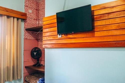 TV a/nebo společenská místnost v ubytování Hotel Pato Branco