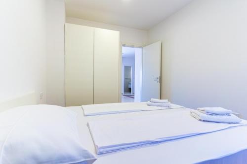 Posteľ alebo postele v izbe v ubytovaní ISLAND GETAWAY