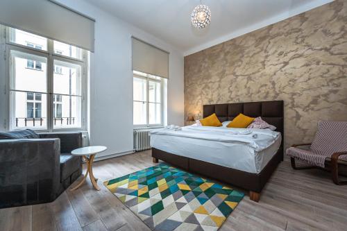 Postel nebo postele na pokoji v ubytování Wishlist Old Prague Residences - Haštalská